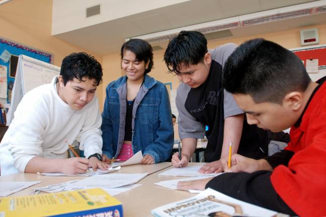 Students learn together at an Internationals Network school